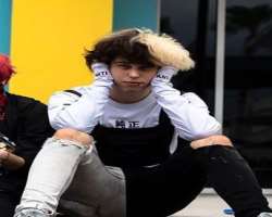 His original hair is black but he dyed it half-blonde in January 2020 to garner more popularity on social media.